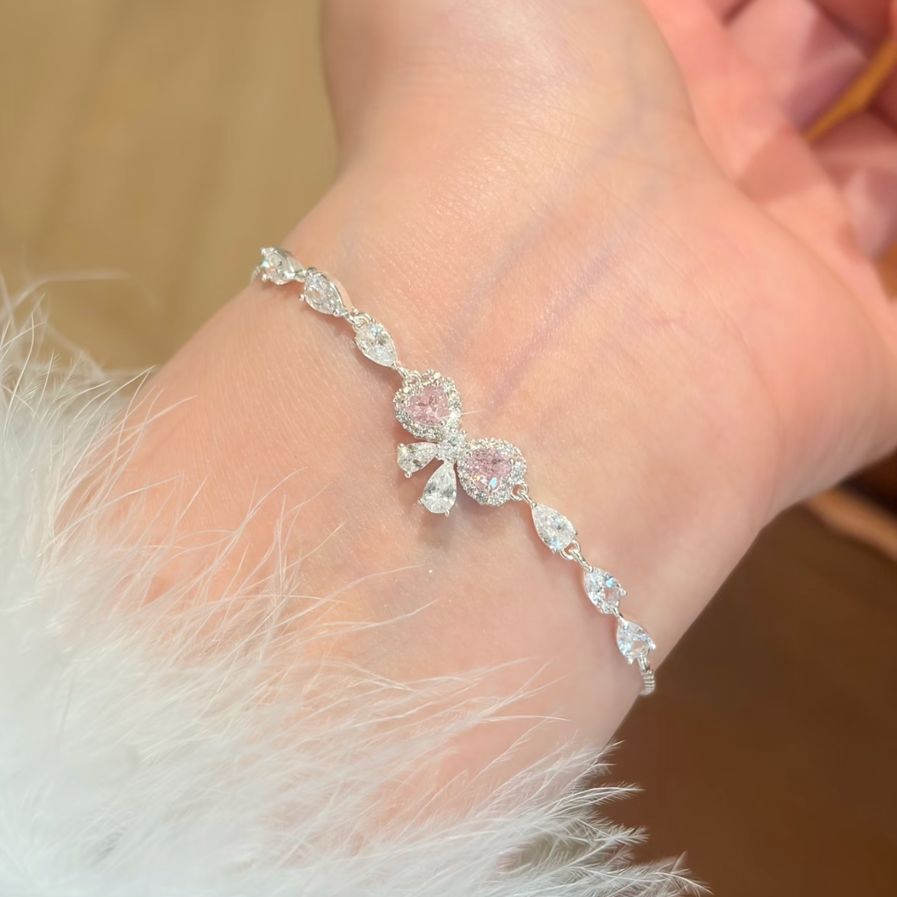 "Blush Heartbeat" Pavé Zirconia Bow Bracelet