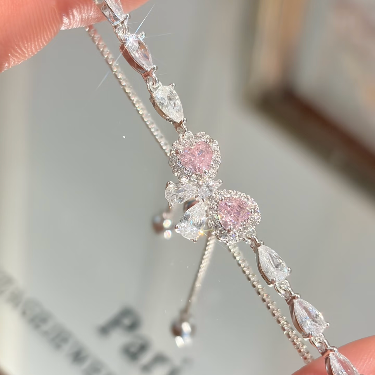 "Blush Heartbeat" Pavé Zirconia Bow Bracelet