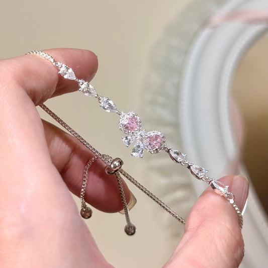 "Blush Heartbeat" Pavé Zirconia Bow Bracelet